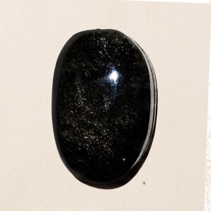 Cabochon en obsidienne dorée