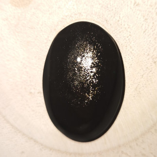 Cabochon ovale en obsidienne argentée, idéale pour vos créations.