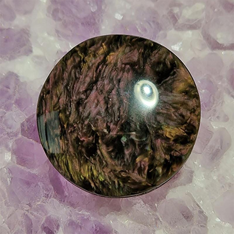 Cabochon en obsidienne en manto huichol