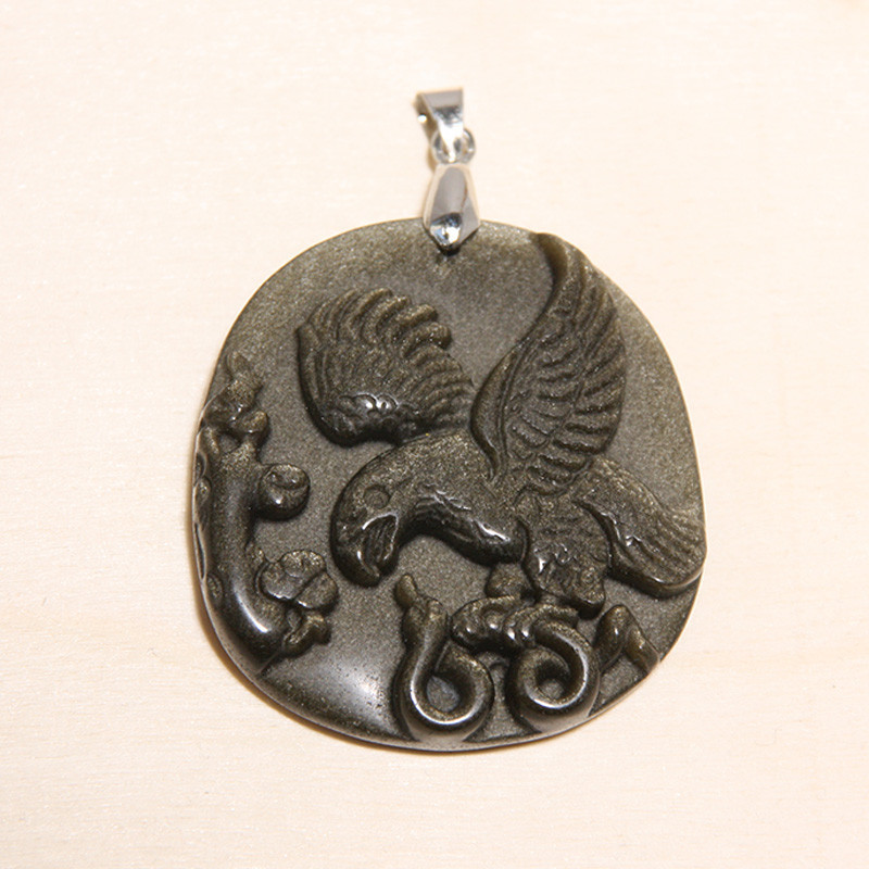 Pendentif en obsidienne dorée