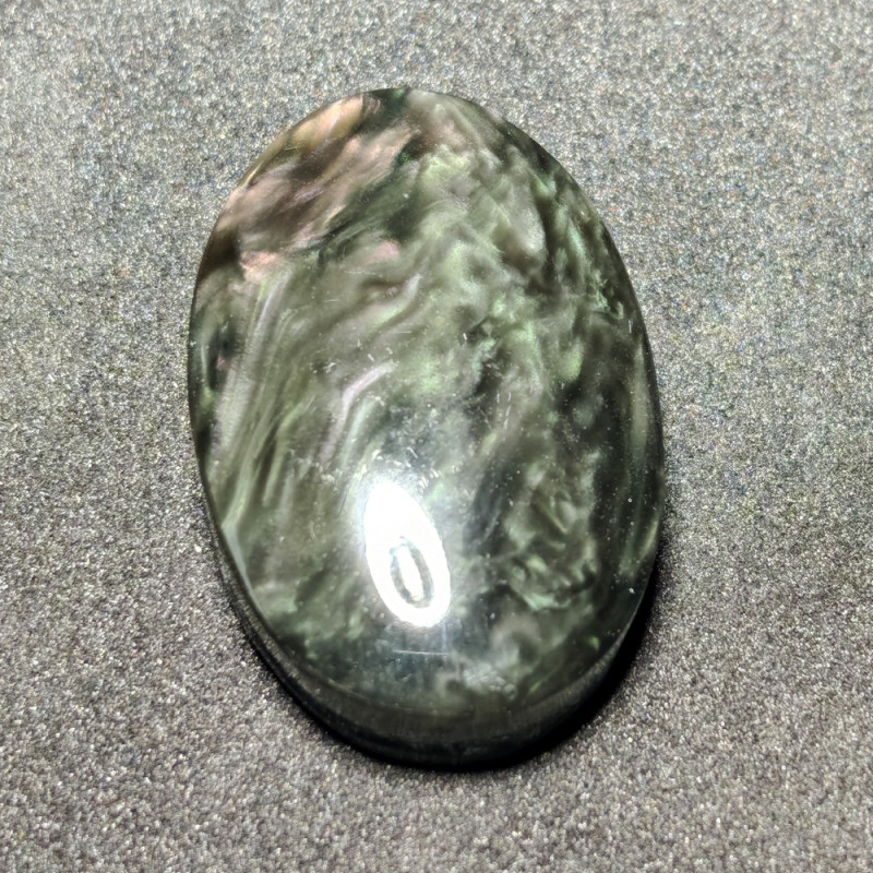 Cabochon en obsidienne manto huichol Cabochon en obsidienne manto huichol